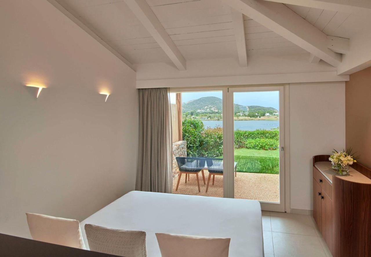 Baia Di Chia Resort Sardinia, Curio Collection By Hilton Exterior photo