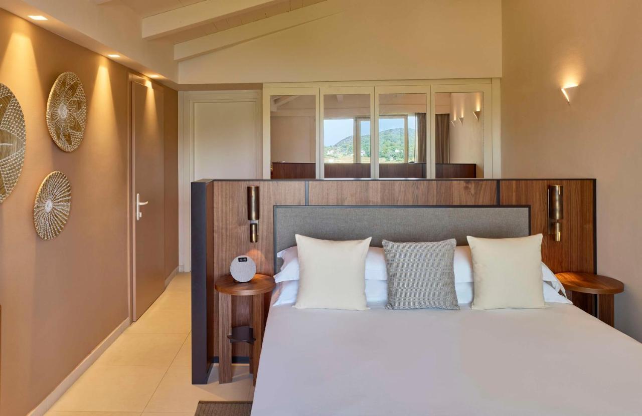 Baia Di Chia Resort Sardinia, Curio Collection By Hilton Exterior photo