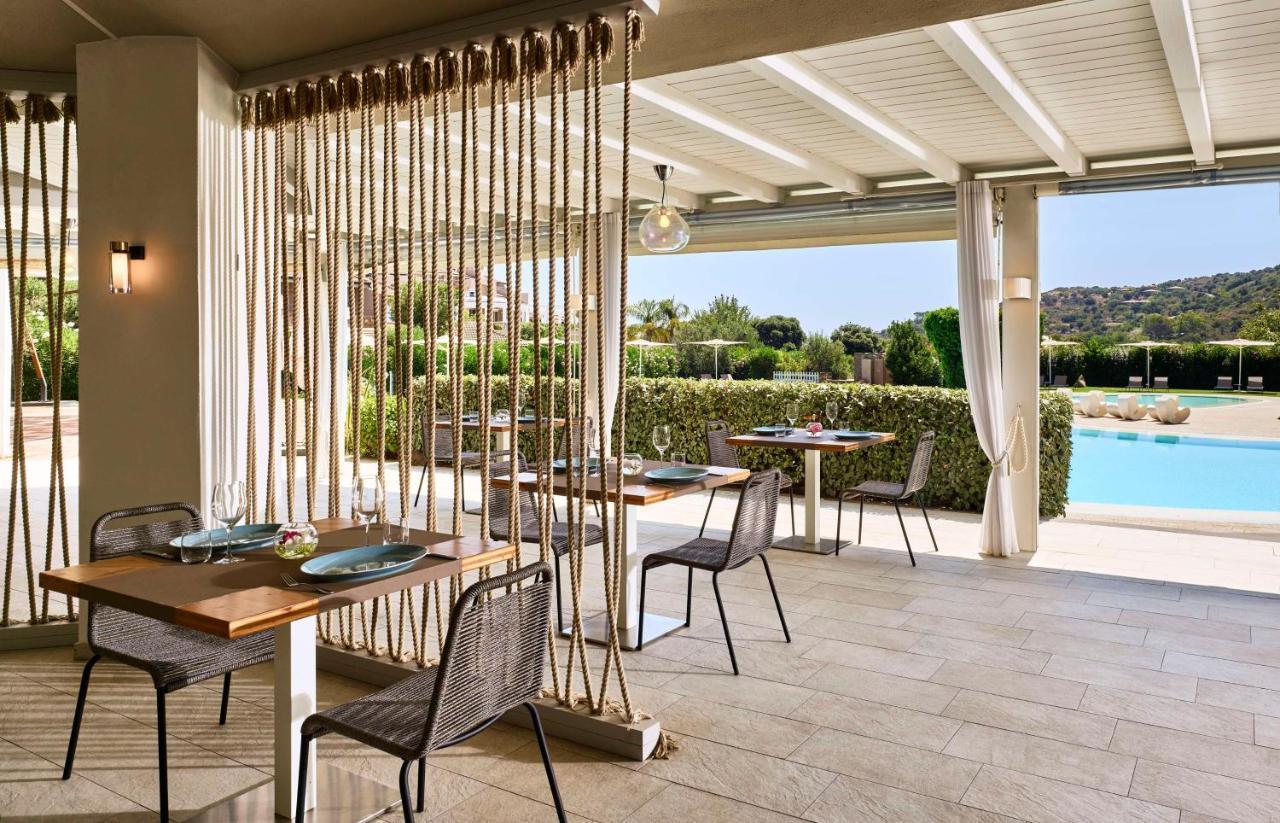 Baia Di Chia Resort Sardinia, Curio Collection By Hilton Exterior photo