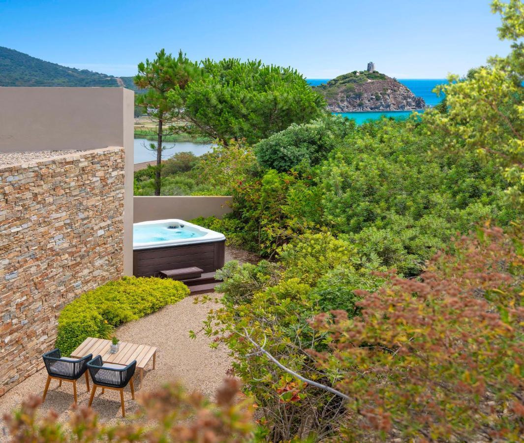 Baia Di Chia Resort Sardinia, Curio Collection By Hilton Exterior photo
