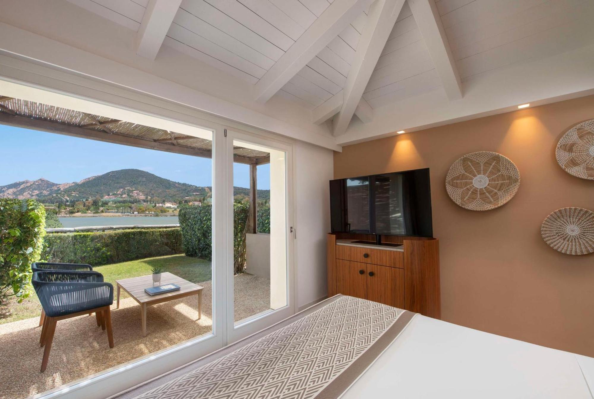 Baia Di Chia Resort Sardinia, Curio Collection By Hilton Exterior photo