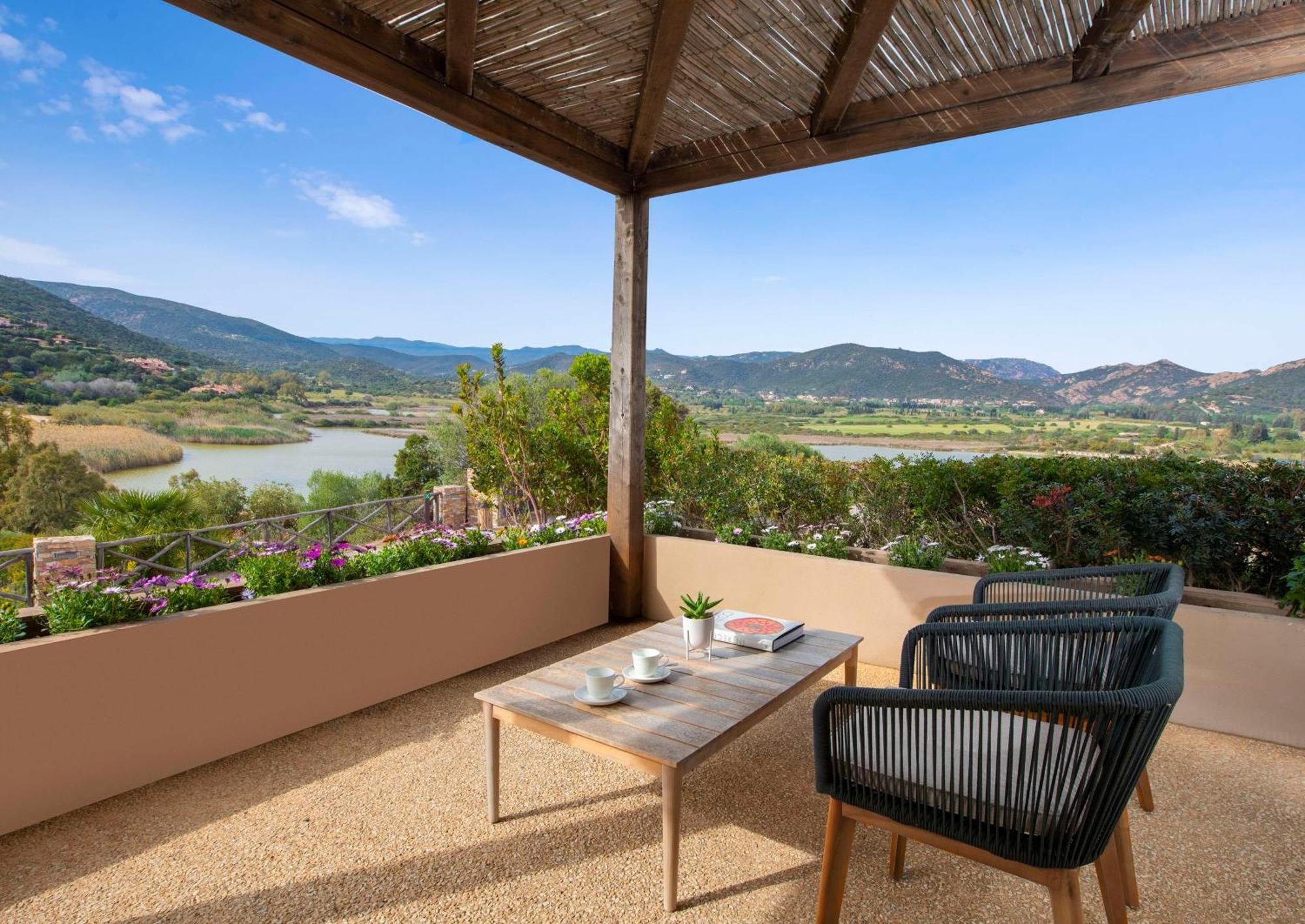 Baia Di Chia Resort Sardinia, Curio Collection By Hilton Exterior photo