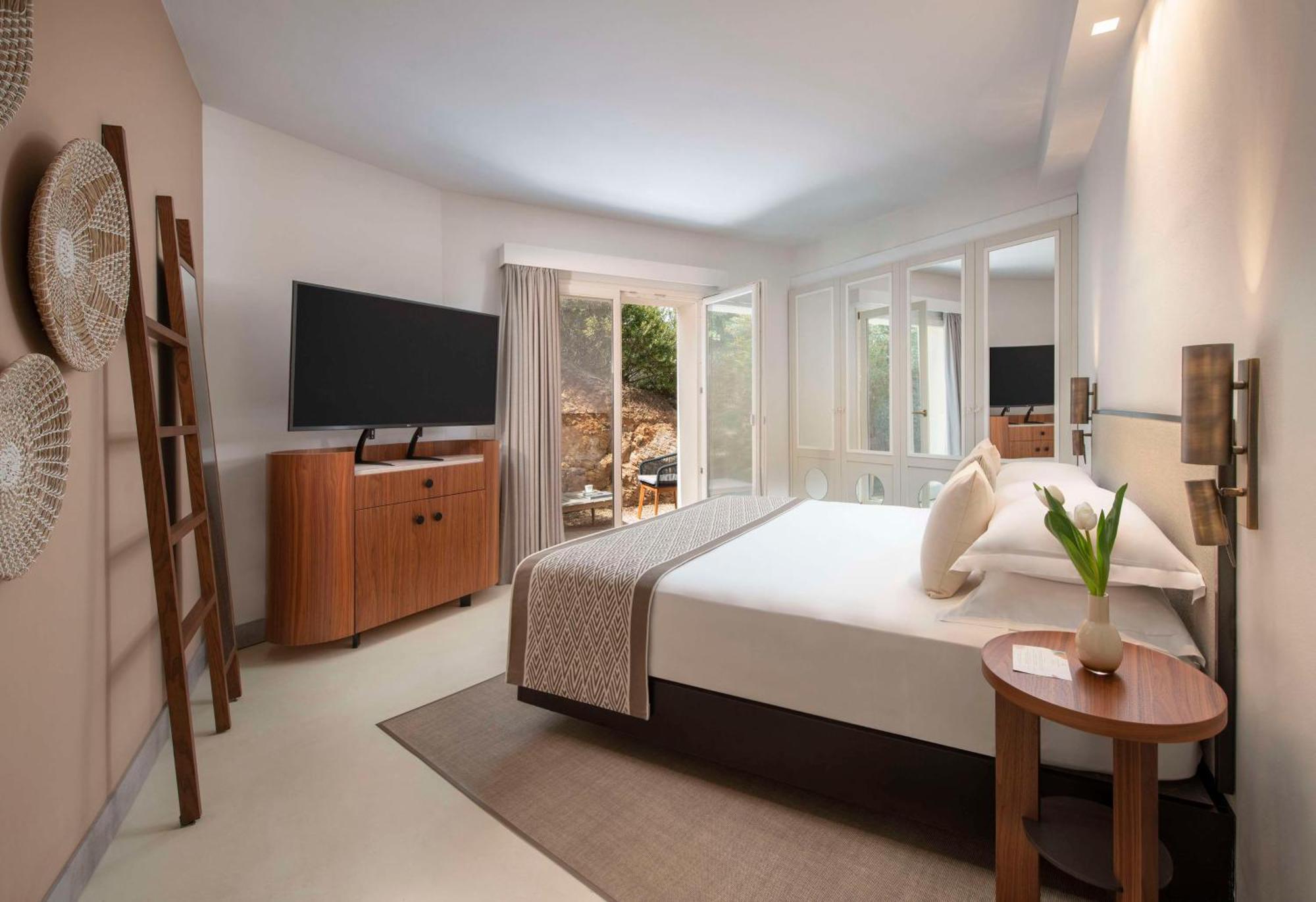 Baia Di Chia Resort Sardinia, Curio Collection By Hilton Exterior photo