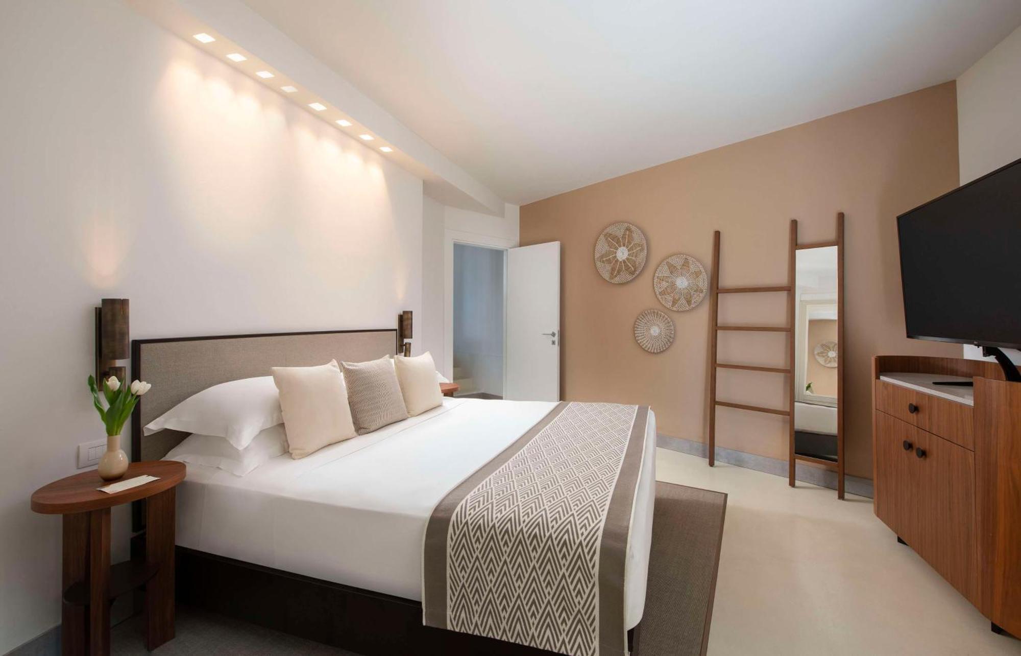 Baia Di Chia Resort Sardinia, Curio Collection By Hilton Exterior photo
